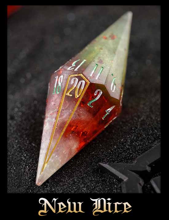 A crystal shard shaped epoxy resin D20 polyhedral die in red and green colors with a white cloud and shiny red foil, with green, gold, and white numbers on a dark background, featuring the words 